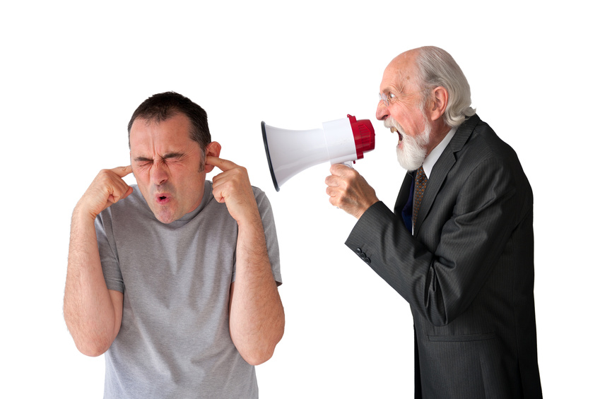 man being yelled at by senior manager